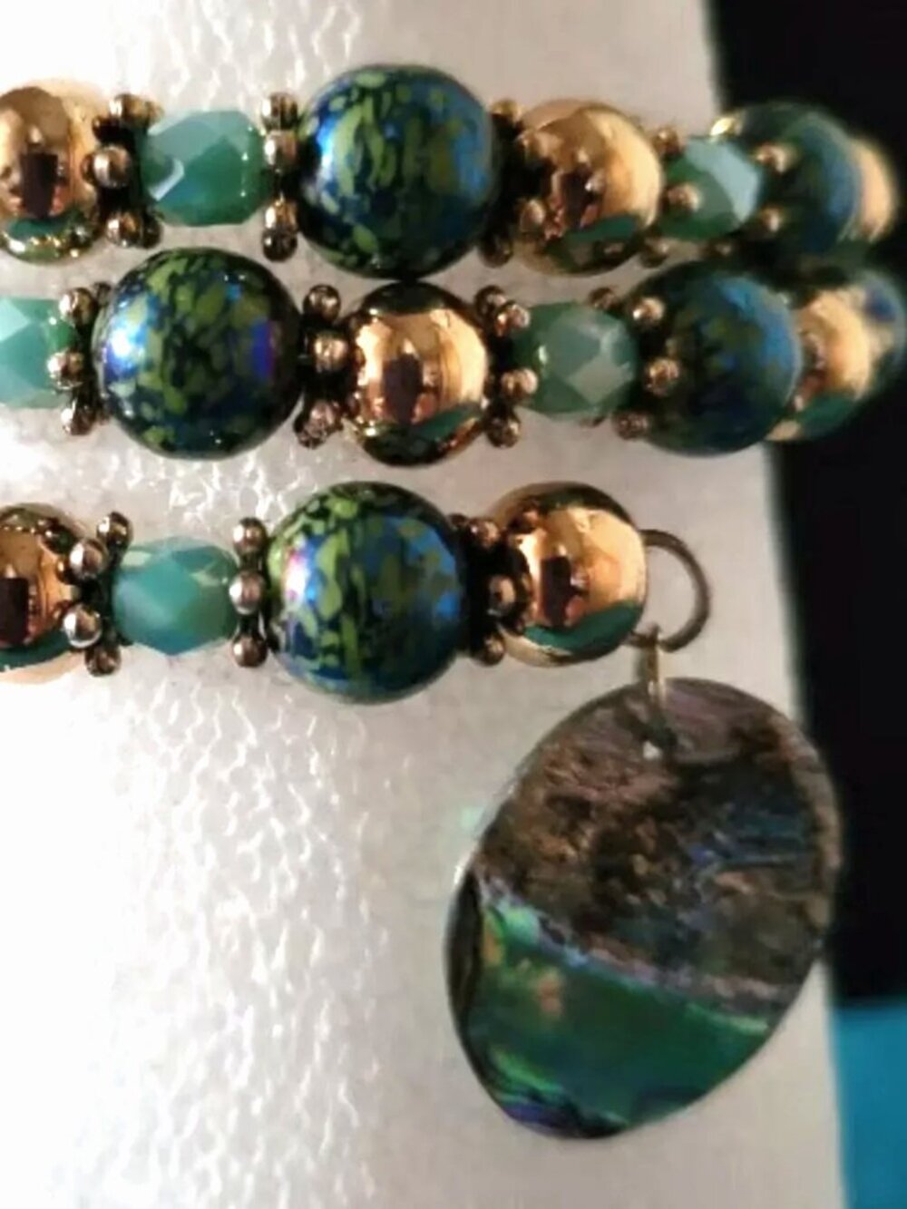 Drop Dead Gorgeous Green Gold and Silver Wrist Wraps with Pearlized Dangle